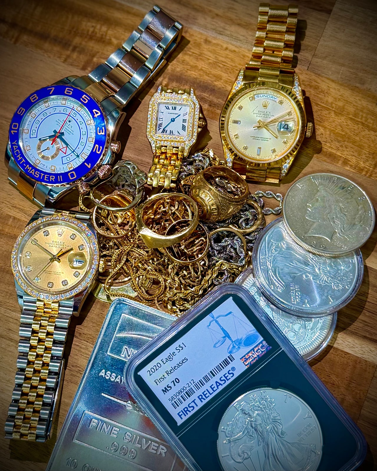 Luxury watches, gold jewelry, silver coins, and precious metals available for private evaluation